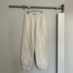 Brandy Melville off-white joggers.
